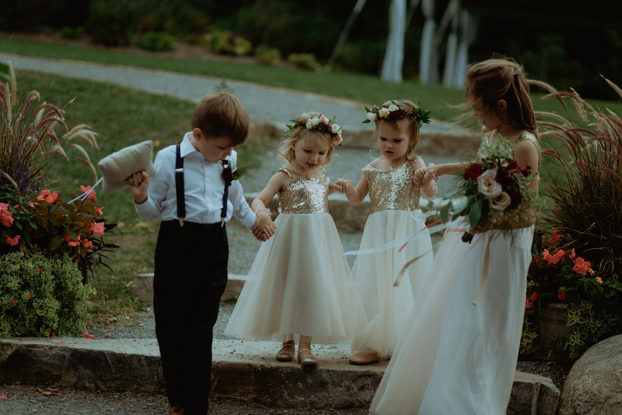 Ring bearer and flower girls entrance wedding photography outdoor barn venue peterborough